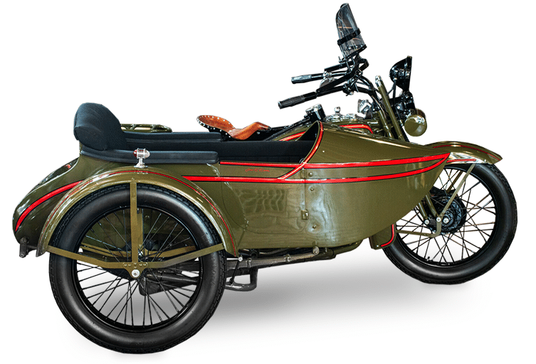 1920s green motorcycle with sidecar attached