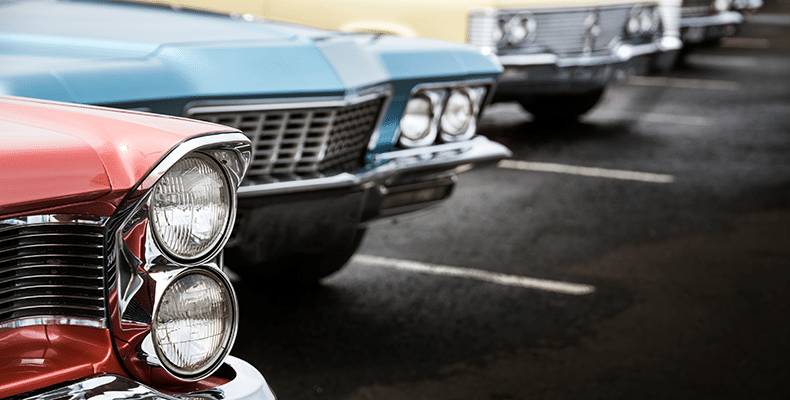 Classic cars in parking lot