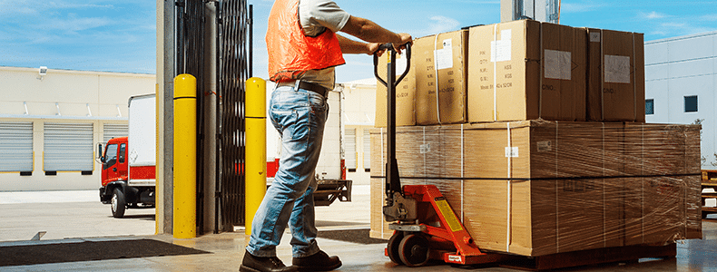Man loading freight for less-than-truckload or full truckload shipment